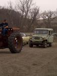 Tractor pulling Patrol to loading spot